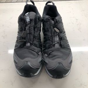 Salomon Pro 3D trail running shoes.